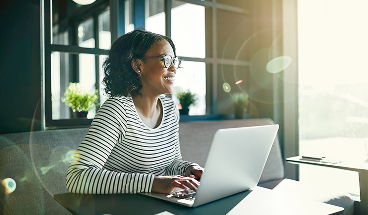 African American Female Business Professional Looking Out Window