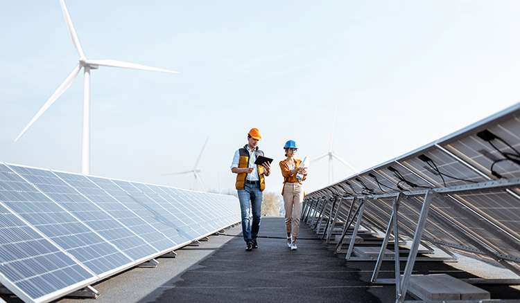 Workers Outside Near Wind Power Plant